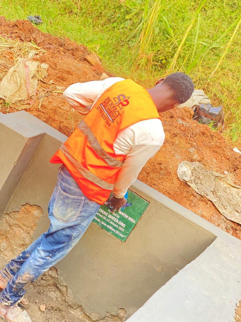 An Oasis Water well being commissioned in a Ugandan community